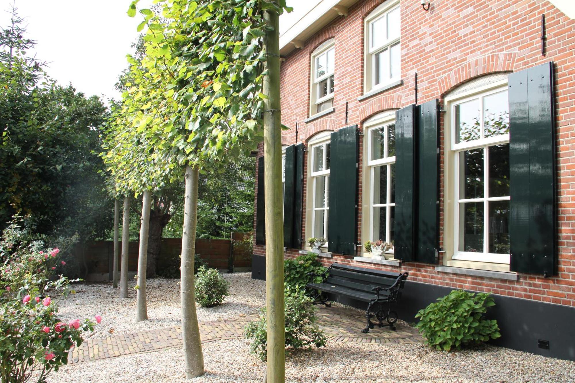 Familiehuis De Betuwe met kunstgras tennisbaan en sauna Villa Erichem Buitenkant foto